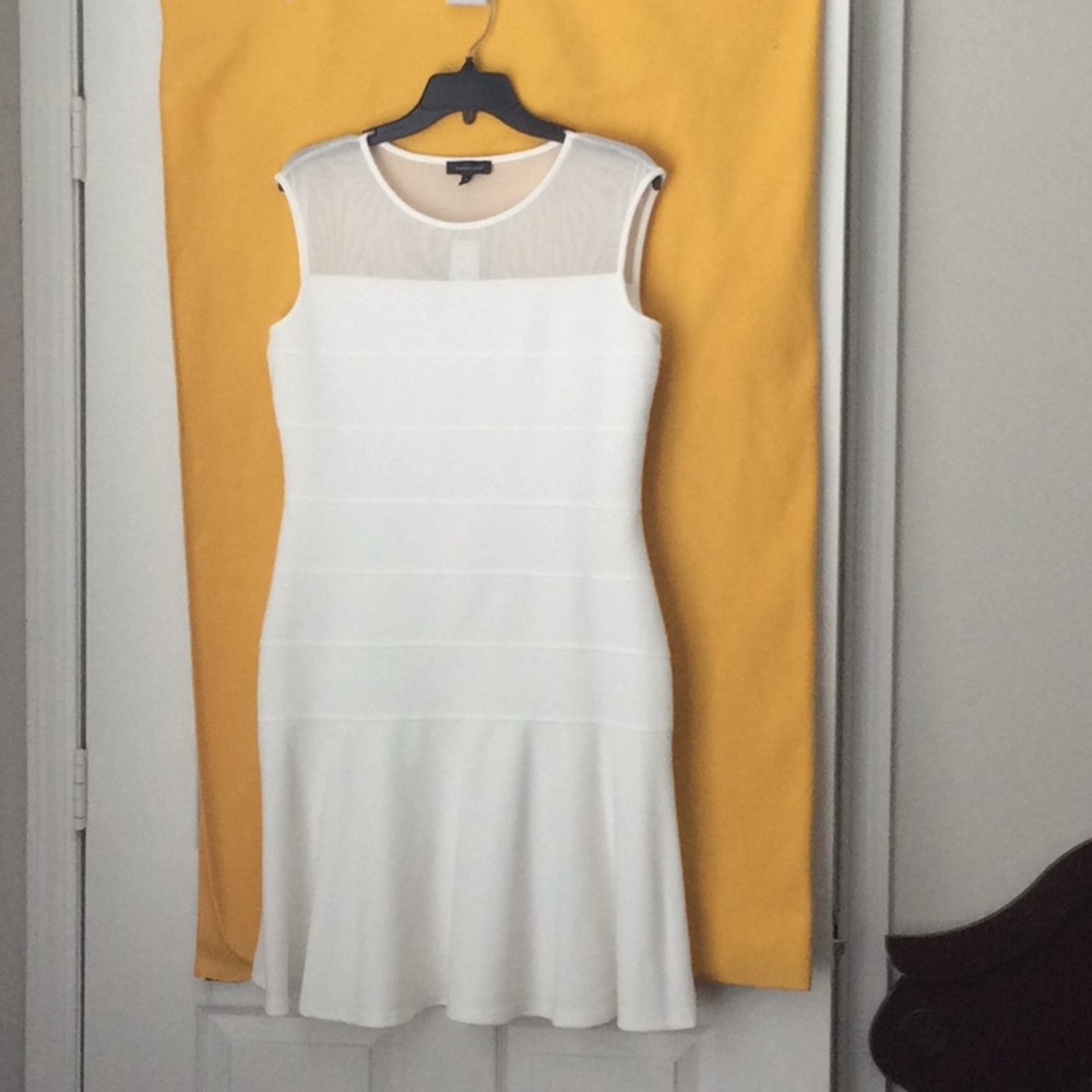 Ivory dress. Fitted upper, slight flare on bottom
